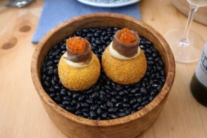 Pani Puri Relleno de Queso Galmesano con Sardina Ahumada y Sopleteada. Restaurante bacelo en Ferrol.